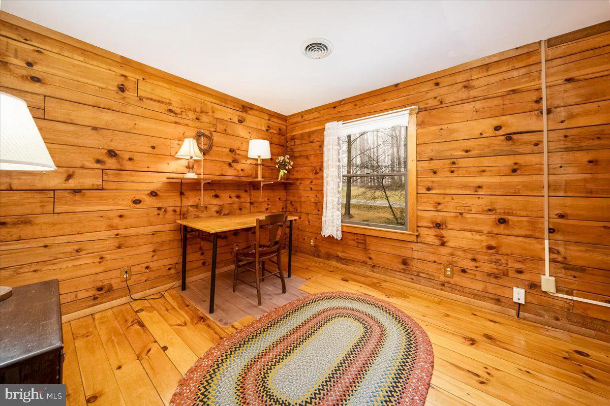 2324 Carrollton Road Westminster, MD 21157 - Photo 42 of 66 a view of a balcony with table and chairs