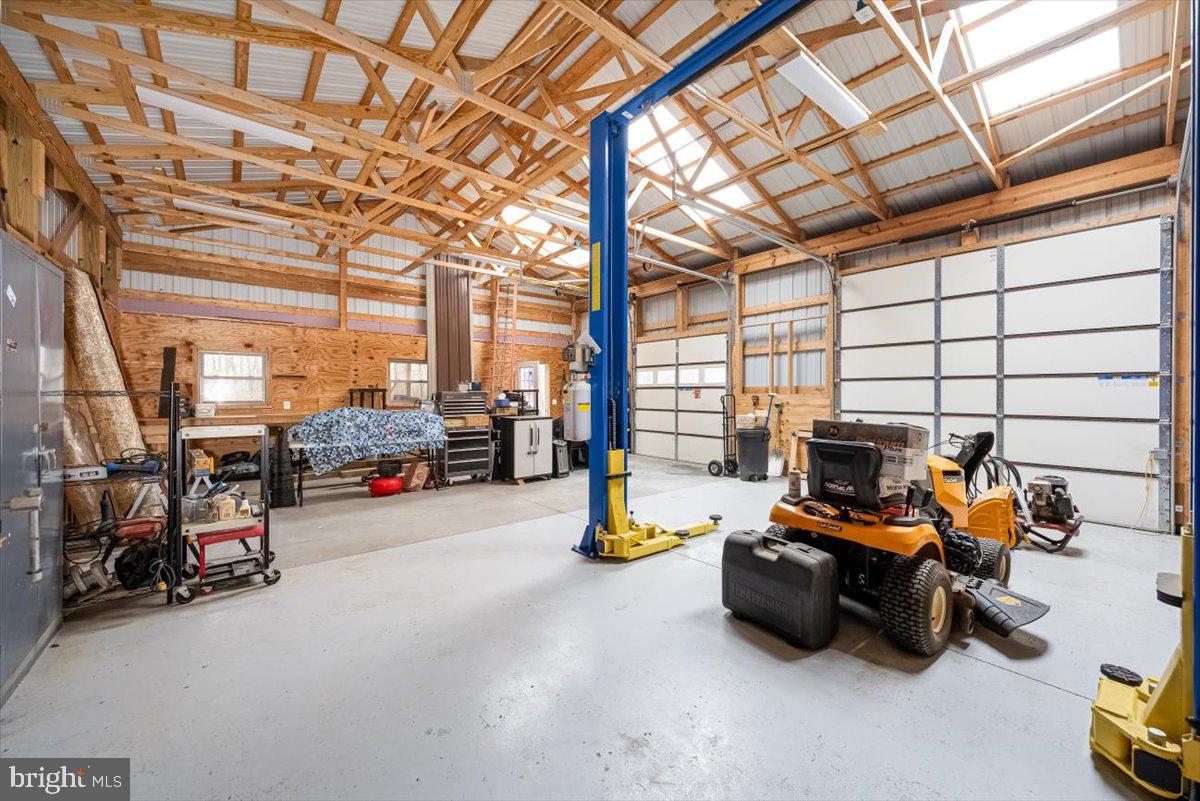 2324 Carrollton Road Westminster, MD 21157 - Photo 51 of 66 a view of a garage with cars