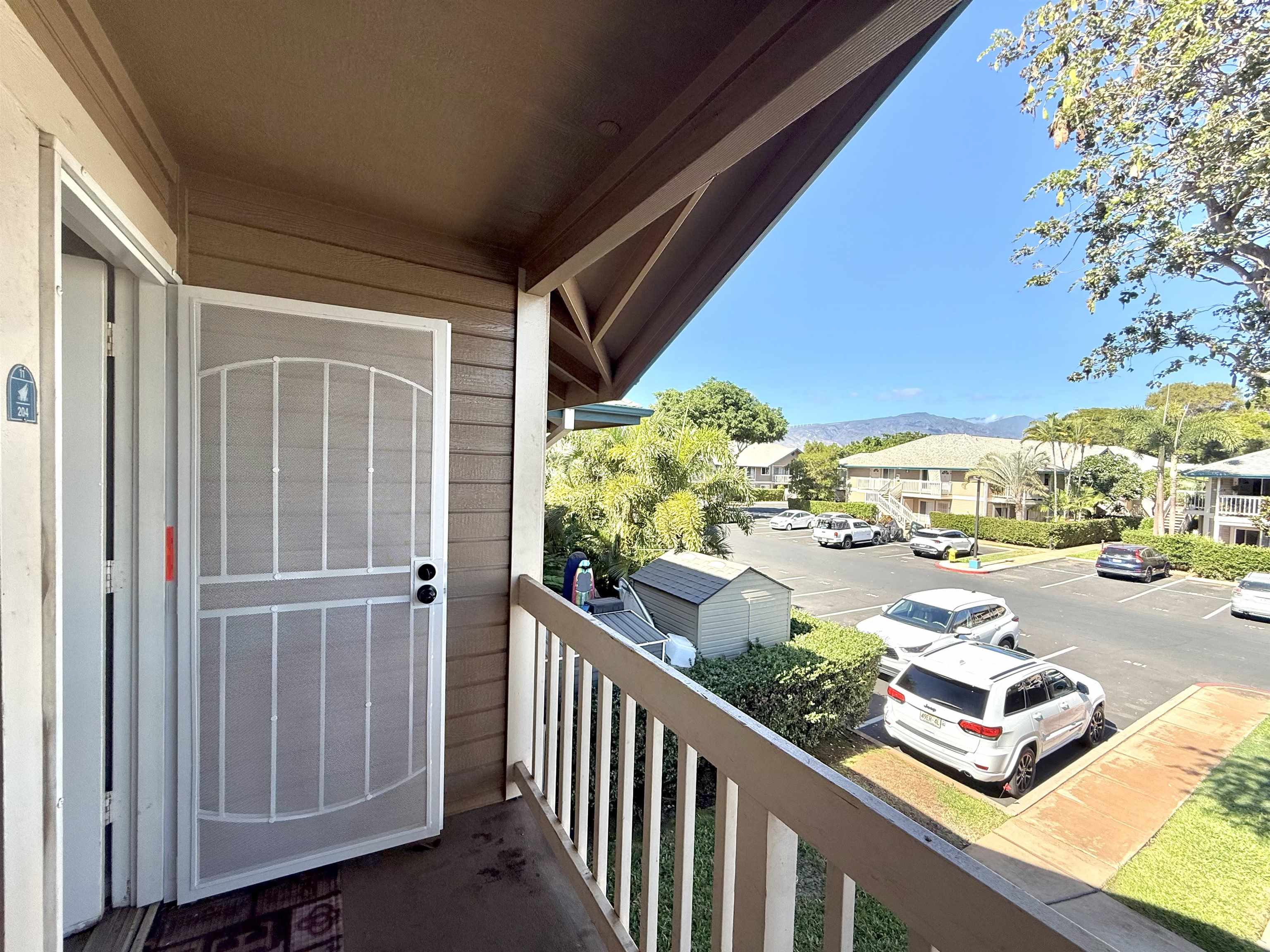 a view of a balcony with lake view