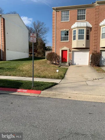 a view of small space in front of a house