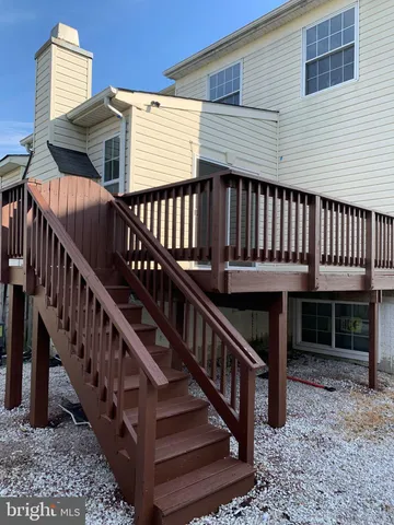 an empty room with wooden floor