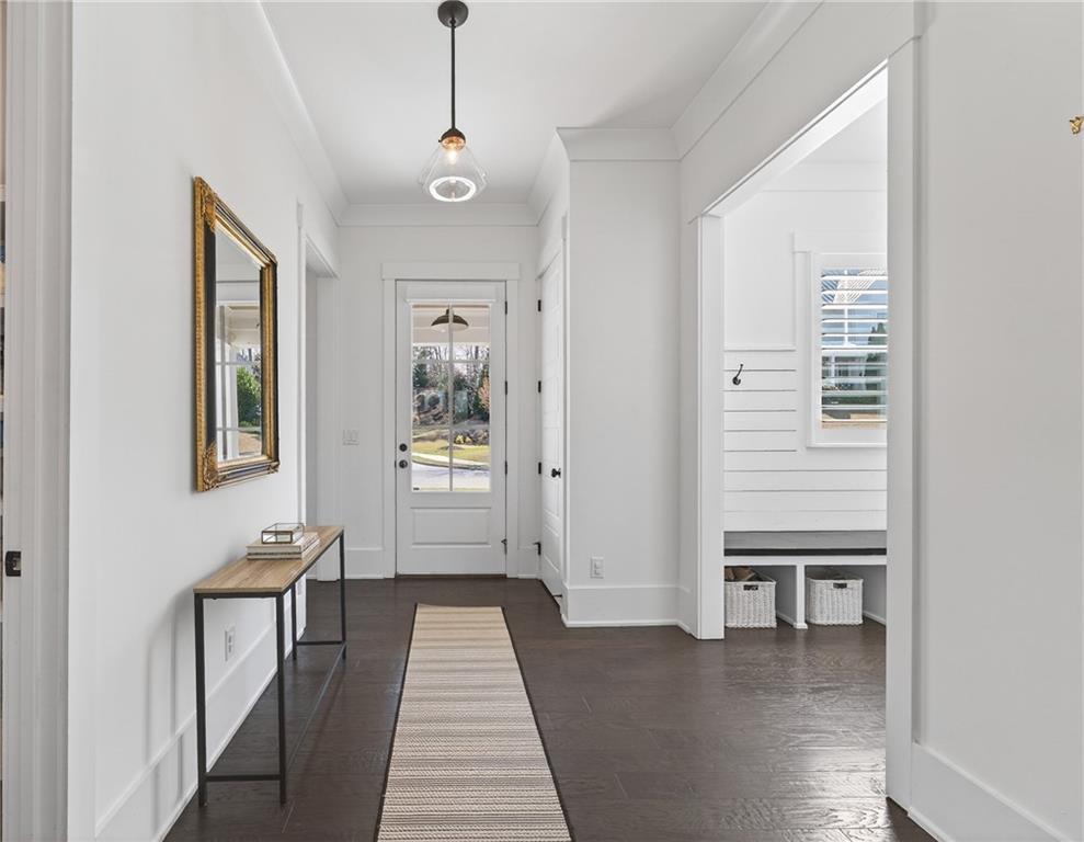 554 Gables Run Milton, GA 30004 - Photo 15 of 47 a view of a room with wooden floor and windows
