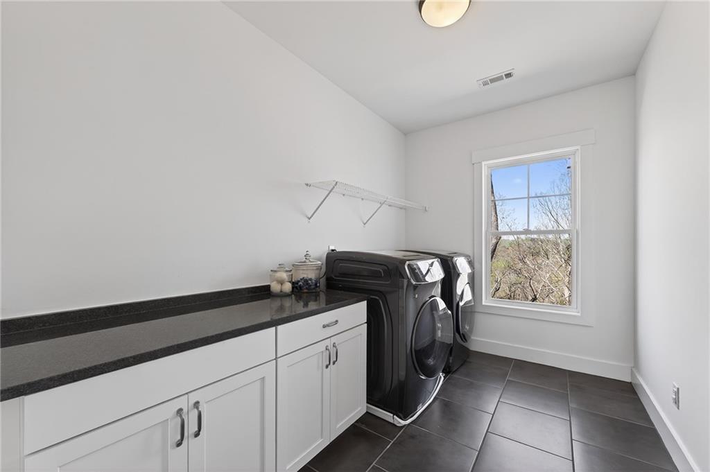 554 Gables Run Milton, GA 30004 - Photo 28 of 47 a utility room with closet