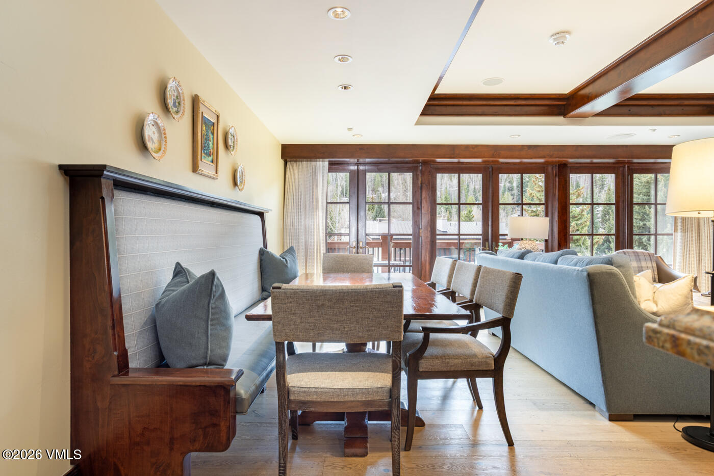1 Willow Bridge Road, Unit 33 Vail, CO 81657 - Photo 3 of 40 a view of a dining room with furniture and wooden floor