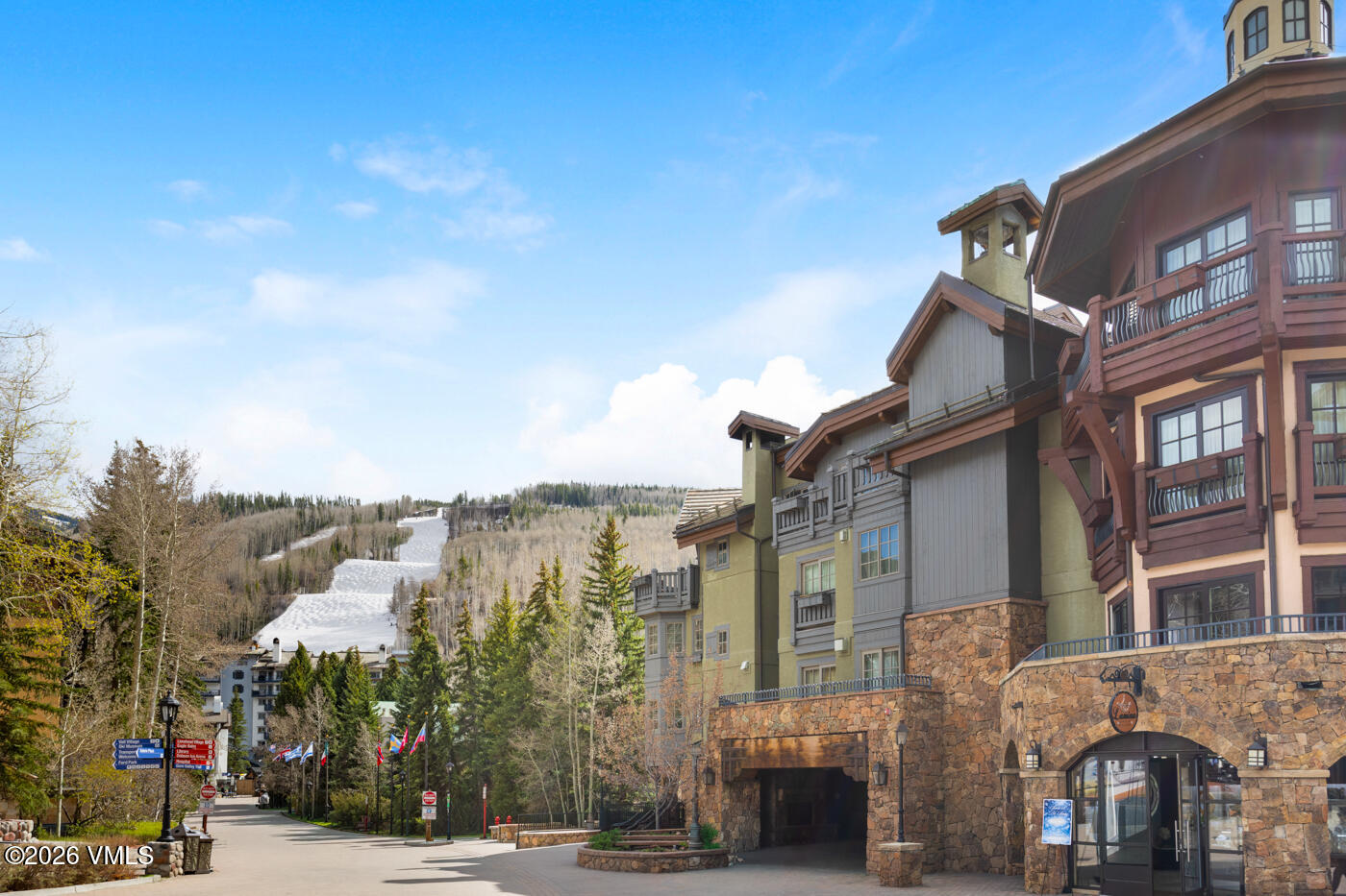 1 Willow Bridge Road, Unit 33 Vail, CO 81657 - Photo 34 of 40 a view of a street with a building in the background