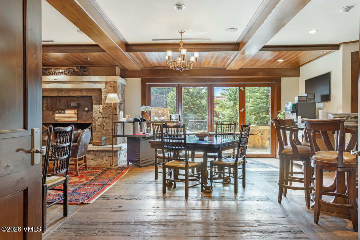 1 Willow Bridge Road, Unit 33 Vail, CO 81657 - Photo 36 of 40 a view of a dining room with furniture window and outside view