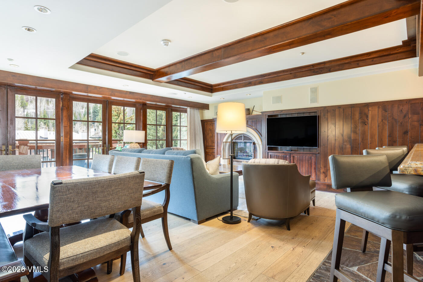 1 Willow Bridge Road, Unit 33 Vail, CO 81657 - Photo 4 of 40 a living room with furniture and a flat screen tv