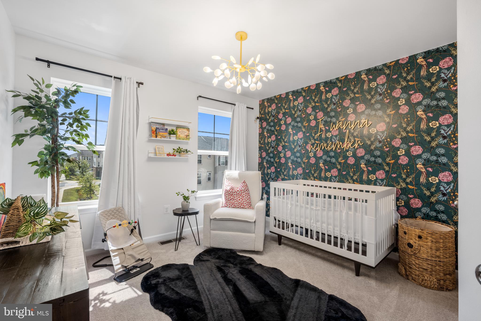 15946 Coolidge Avenue Silver Spring, MD 20906 - Photo 19 of 49 a bedroom with furniture and a chandelier