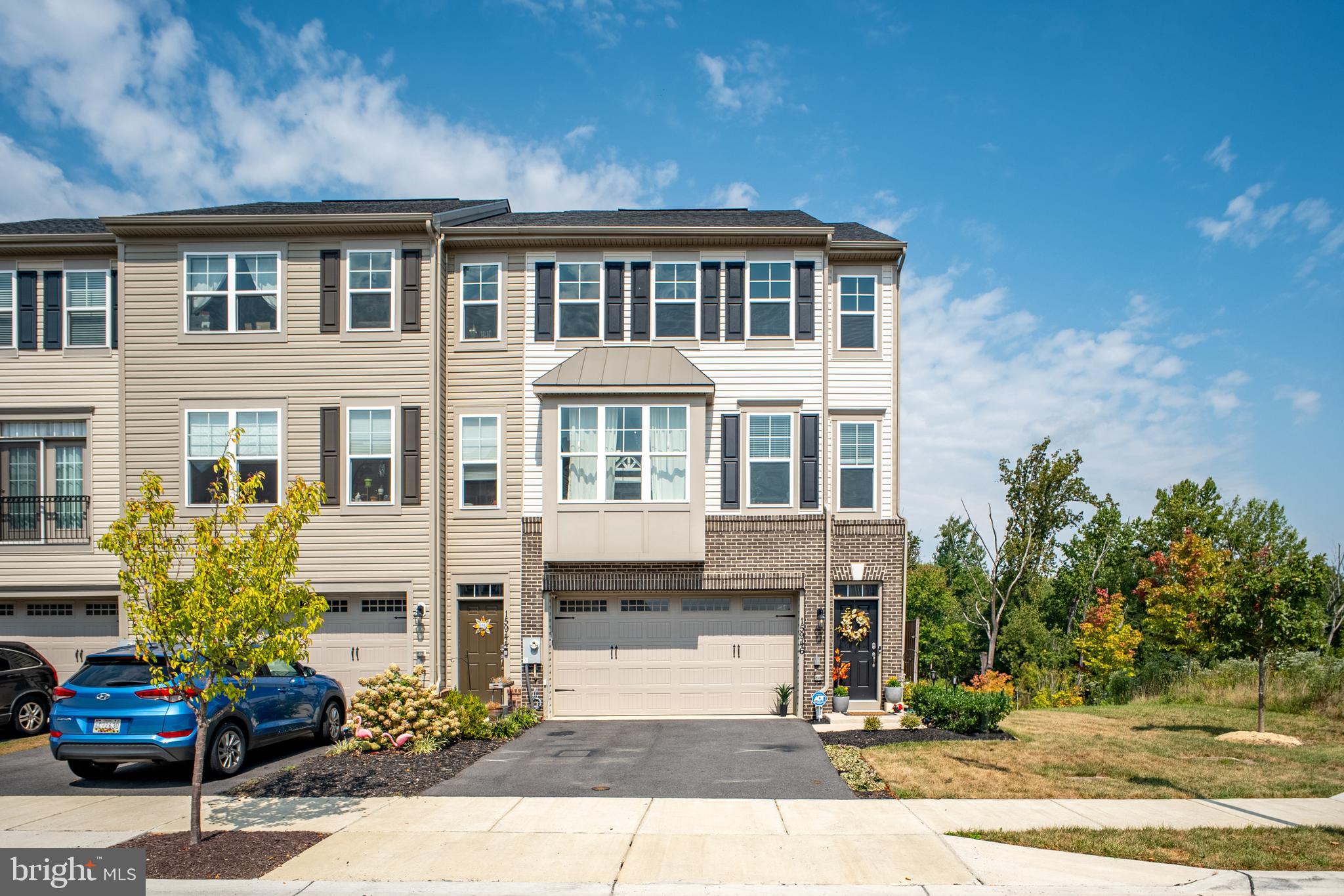 15946 Coolidge Avenue Silver Spring, MD 20906 - Photo 2 of 49 a front view of a house with a garden