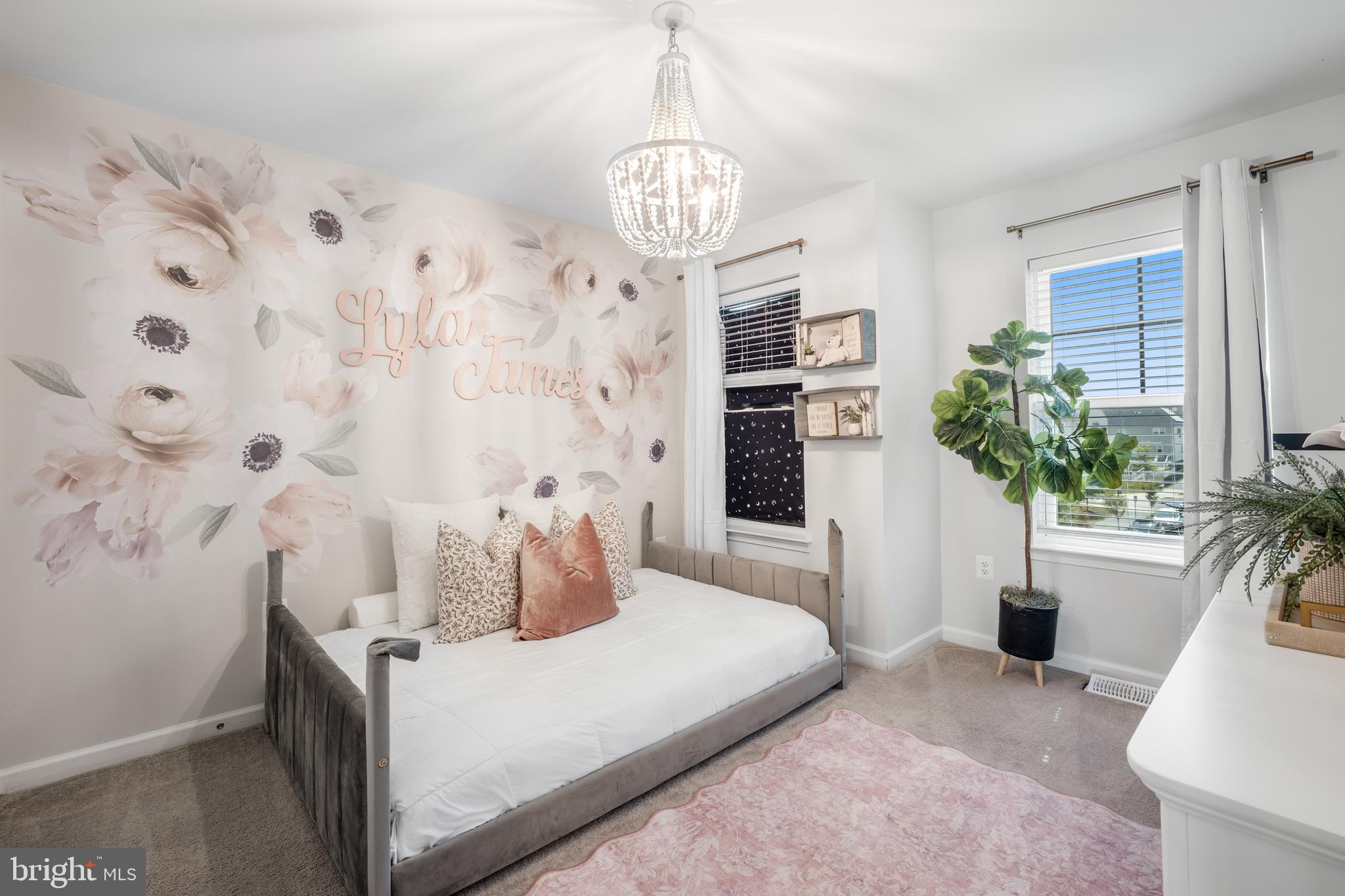 15946 Coolidge Avenue Silver Spring, MD 20906 - Photo 21 of 49 a bedroom with bed and a potted plant