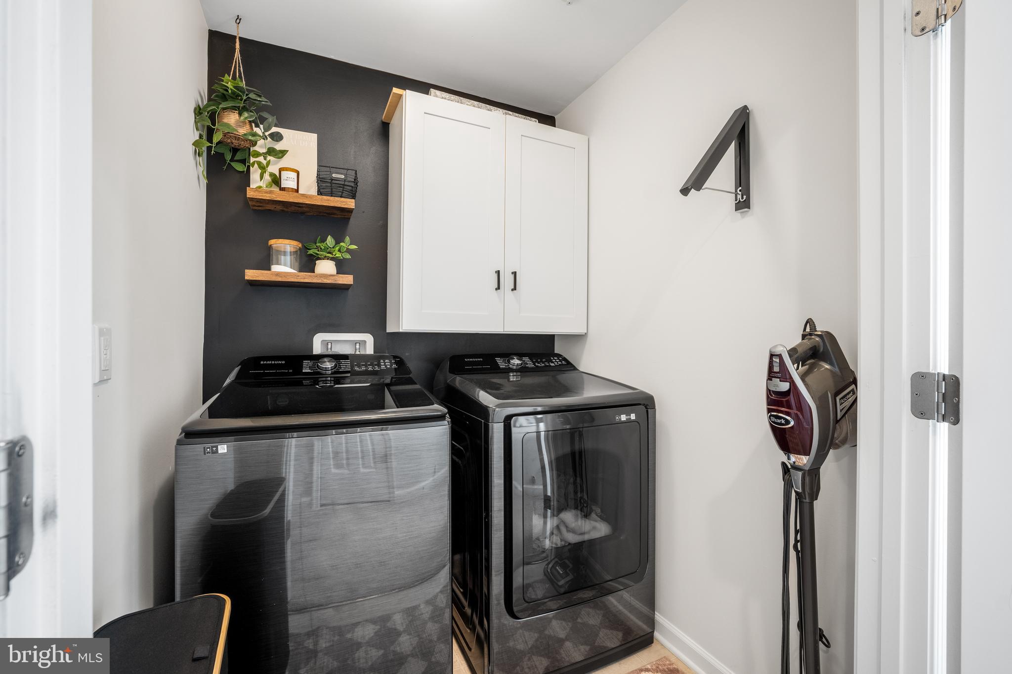 15946 Coolidge Avenue Silver Spring, MD 20906 - Photo 23 of 49 a kitchen with a stove and a refrigerator