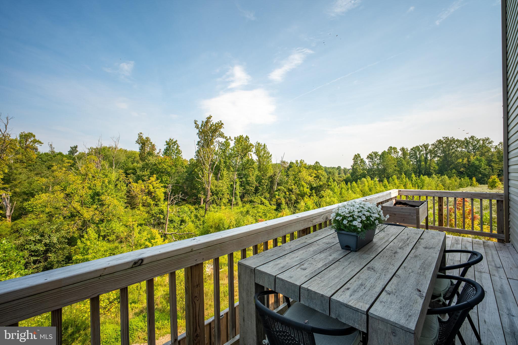 15946 Coolidge Avenue Silver Spring, MD 20906 - Photo 24 of 49 a view of a balcony with wooden floor and fence