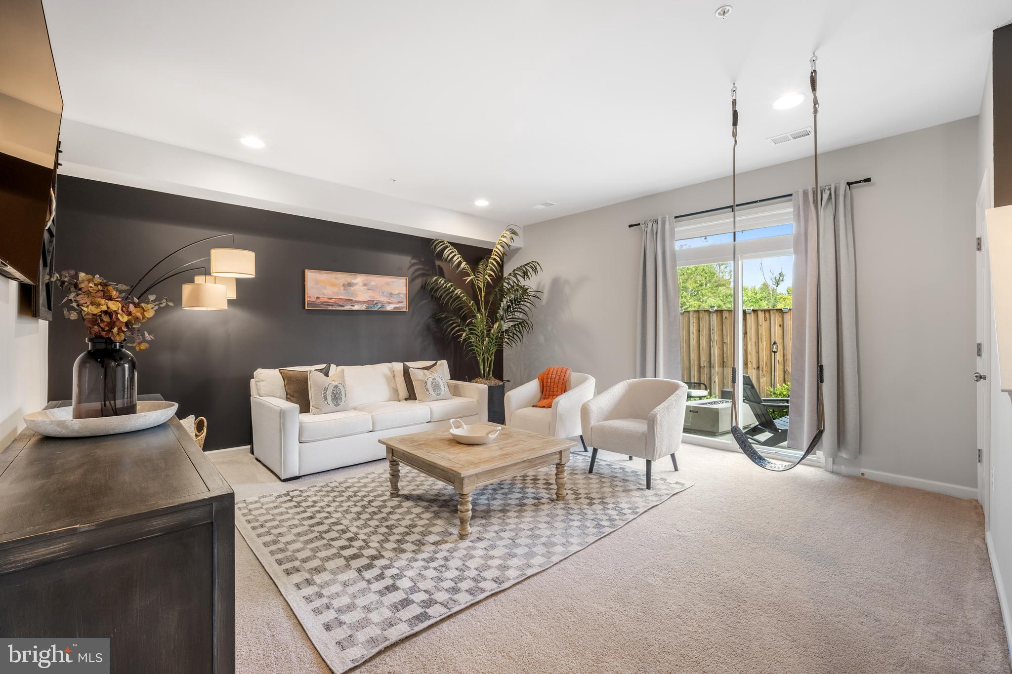 15946 Coolidge Avenue Silver Spring, MD 20906 - Photo 43 of 49 a living room with furniture rug and window