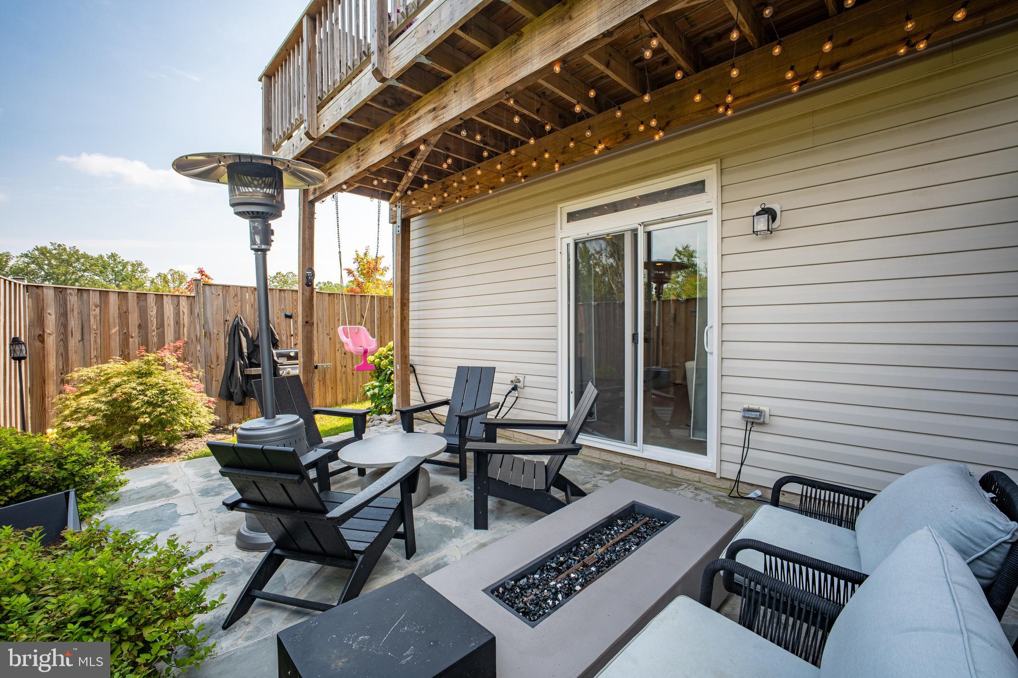 15946 Coolidge Avenue Silver Spring, MD 20906 - Photo 6 of 49 a view of a patio with a table and chairs