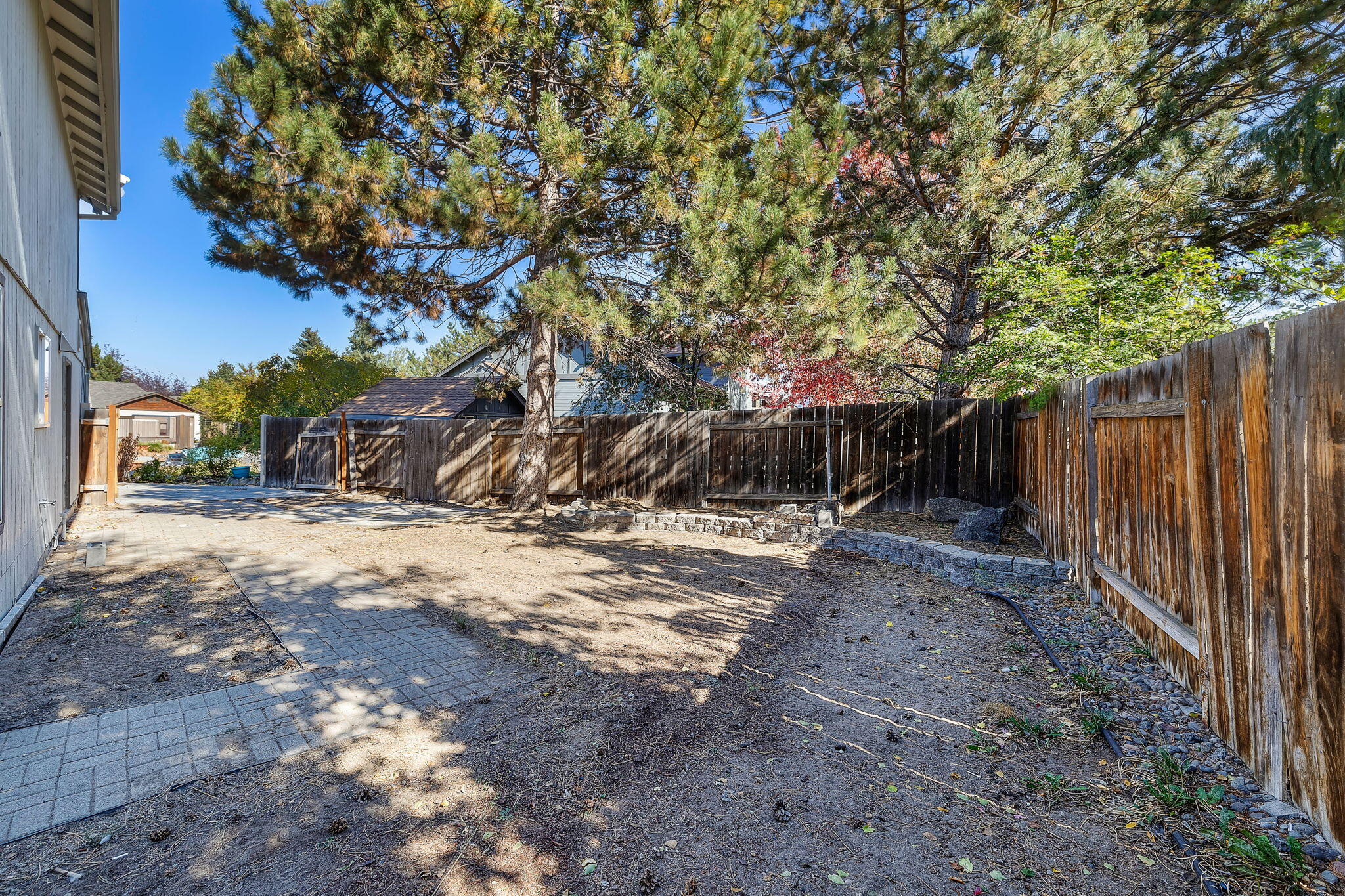 3025 Northeast Raleigh Court Bend, OR 97701 - Photo 28 of 34 Gate leads to large sideyard with room for boat, RV, toys.