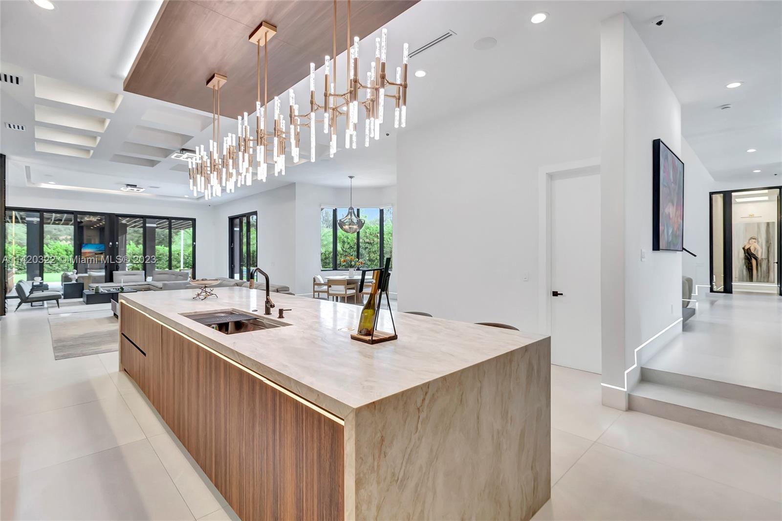 12887 Equestrian Trail Davie, FL 33330 - Photo 21 of 92 a kitchen with counter top space and stainless steel appliances