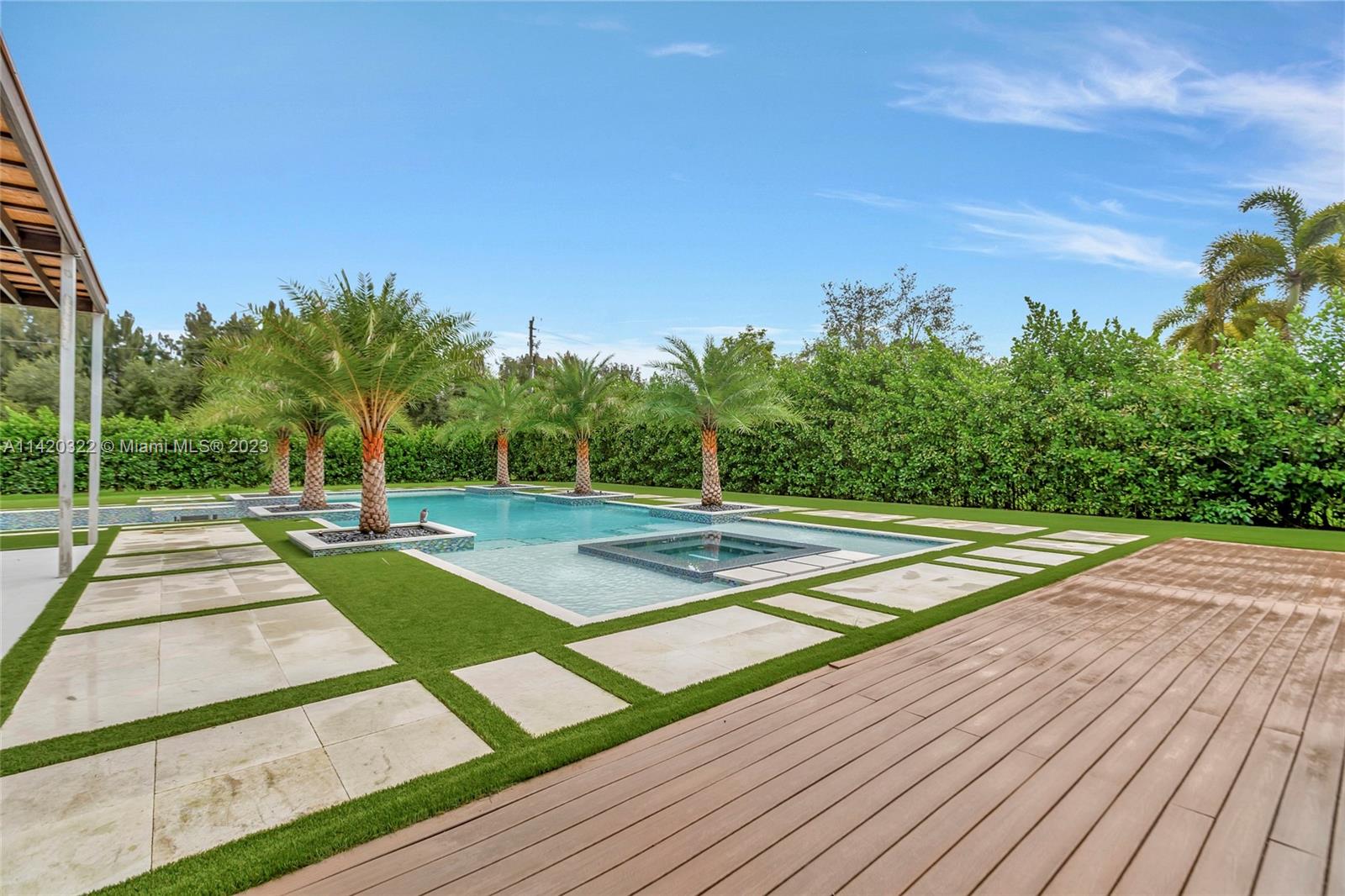 12887 Equestrian Trail Davie, FL 33330 - Photo 47 of 92 a view of a tennis court