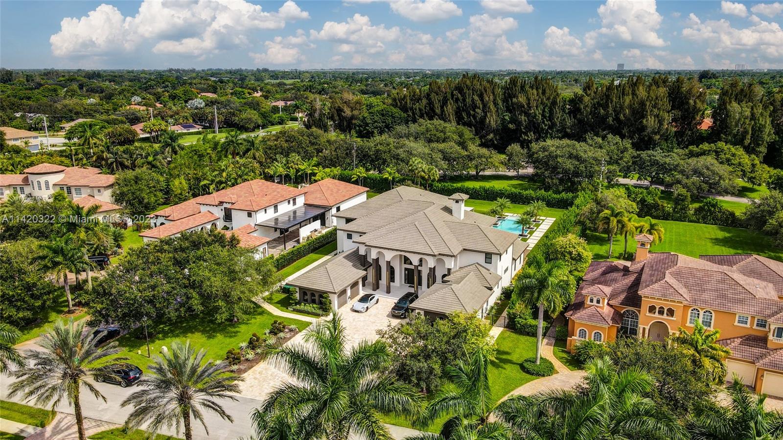 12887 Equestrian Trail Davie, FL 33330 - Photo 5 of 92 an aerial view of multiple house