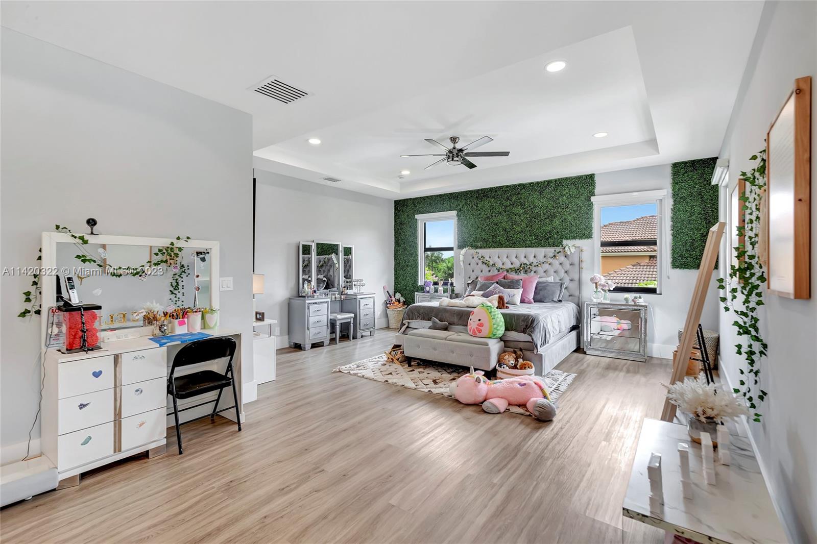 12887 Equestrian Trail Davie, FL 33330 - Photo 69 of 92 a living room with furniture and a wooden floor