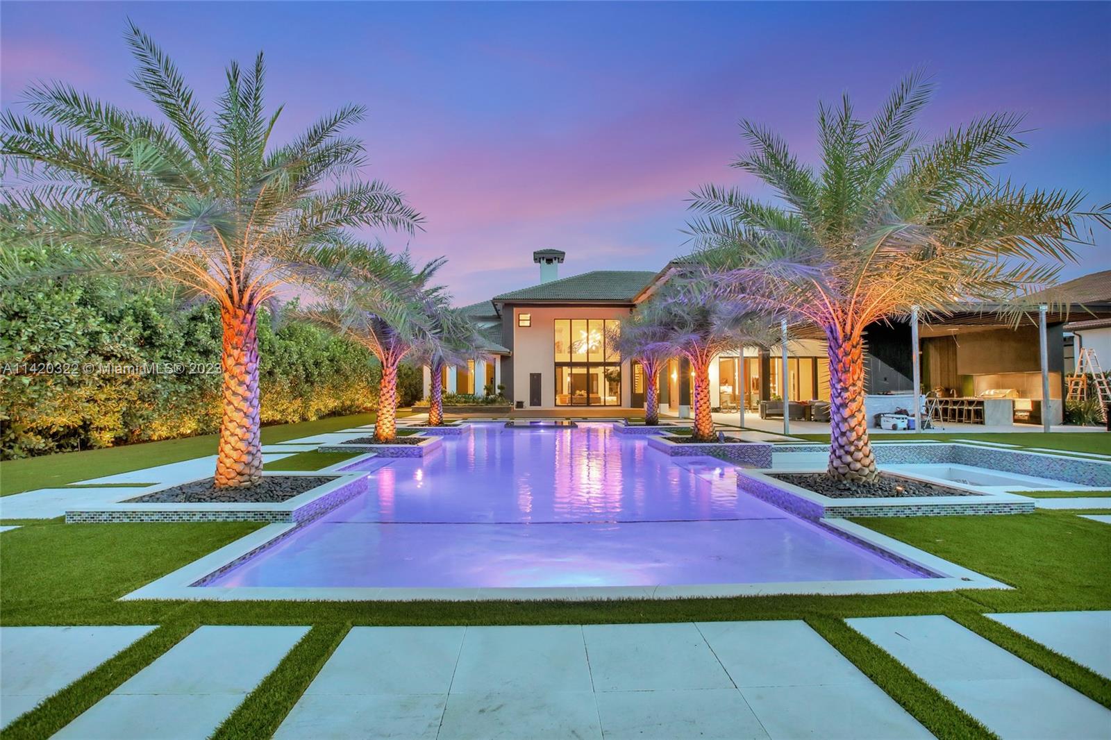 12887 Equestrian Trail Davie, FL 33330 - Photo 85 of 92 a view of an outdoor space and swimming pool