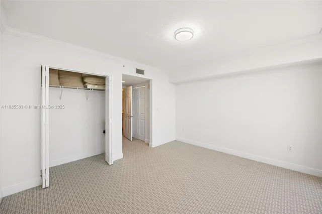 a room with gym equipment and a window