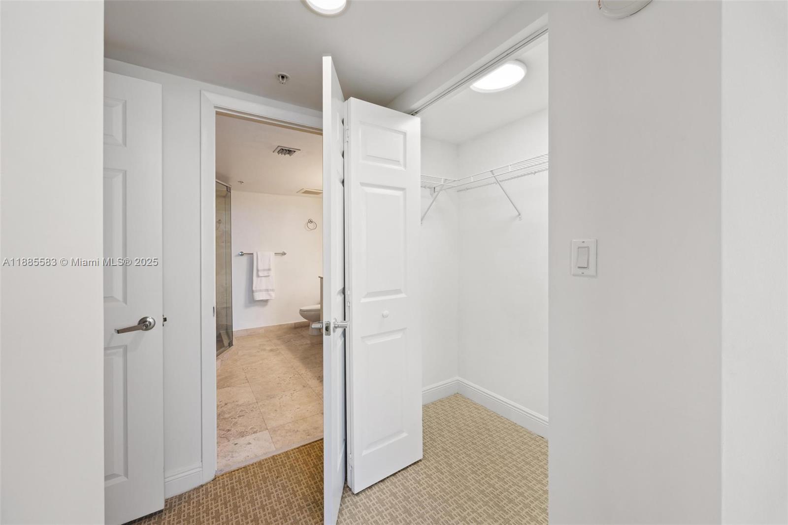 3232 Southwest 22nd Terrace, Unit 1003 Miami, FL 33145 - Photo 17 of 37 Primary Closet