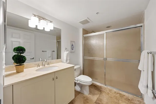 a view of a balcony with wooden floor