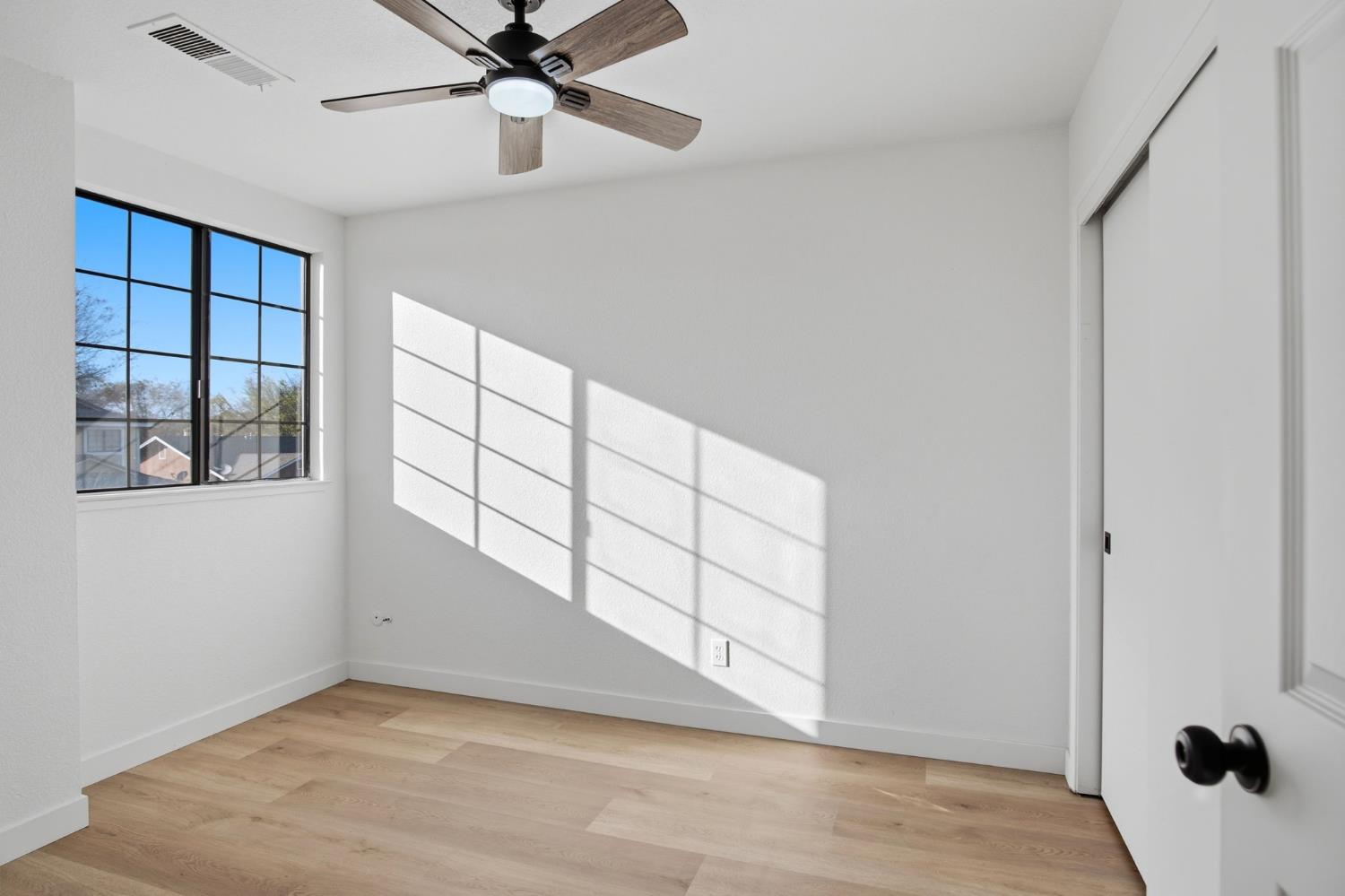 1732 Walpole Drive Modesto, CA 95358 - Photo 14 of 21 a view of an empty room with a window