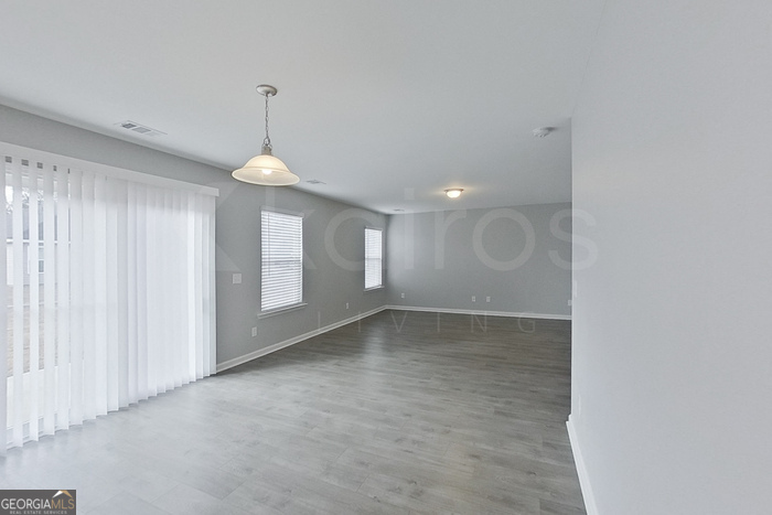 108 Ebenezer Blf Way Springfield, GA 31329 - Photo 11 of 28 a view of an empty room with a window