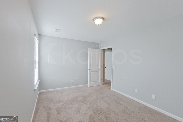 108 Ebenezer Blf Way Springfield, GA 31329 - Photo 14 of 28 a view of an empty room