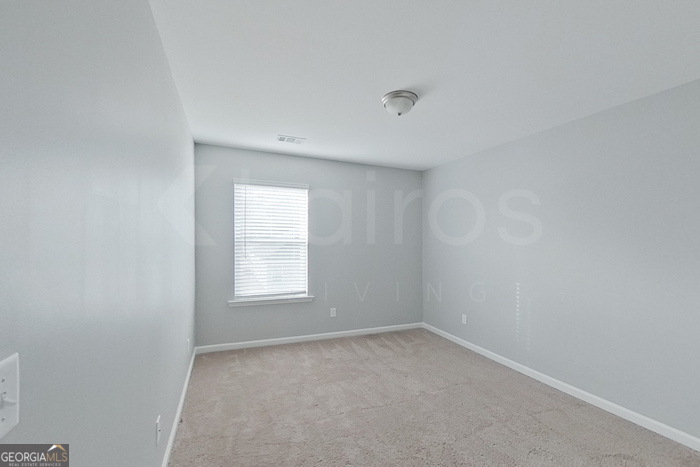 108 Ebenezer Blf Way Springfield, GA 31329 - Photo 15 of 28 an empty room with a window