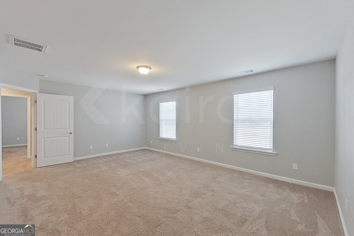 108 Ebenezer Blf Way Springfield, GA 31329 - Photo 20 of 28 a view of an empty room with a window