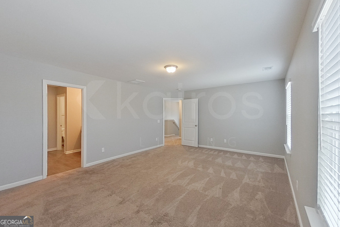 108 Ebenezer Blf Way Springfield, GA 31329 - Photo 21 of 28 a view of an empty room with a window