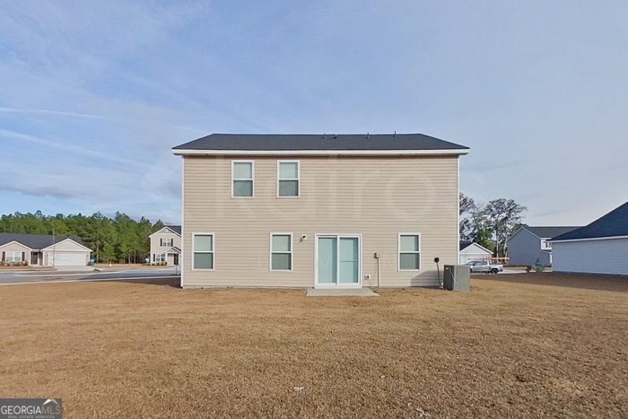 108 Ebenezer Blf Way Springfield, GA 31329 - Photo 25 of 28 a view of a house with backyard and a tree