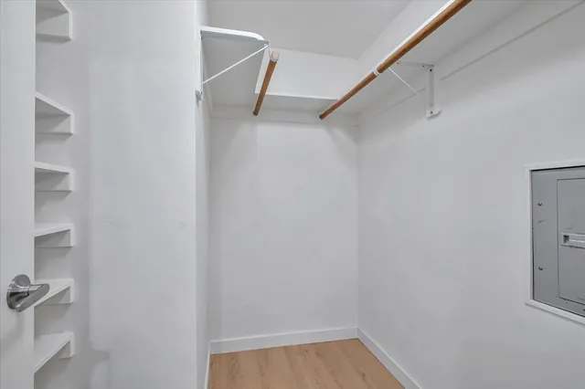 a view of a room with racks on the wall