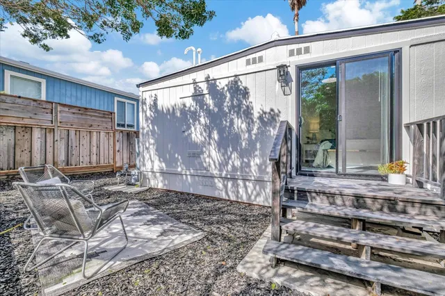 a view of a back yard of a house