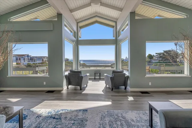 a kitchen with a dining table and chairs