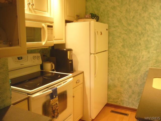 4623 Chestnut Ridge Road, Unit B Amherst, NY 14228 - Photo 5 of 16 Kitchen Beautiful white kitchen with hardwood floo