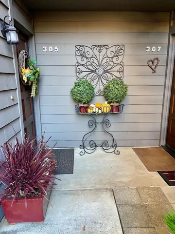 a vase of flowers sitting on a table