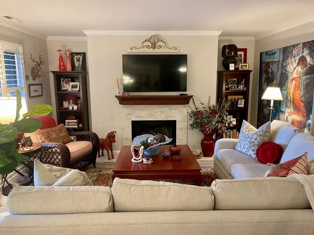 a living room with furniture and a living room