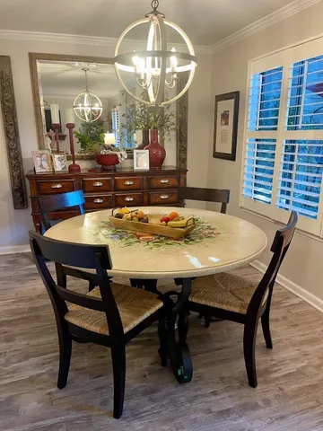 a view of a dining room with furniture