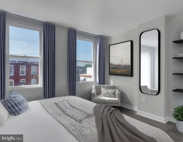 a bedroom with bed and window