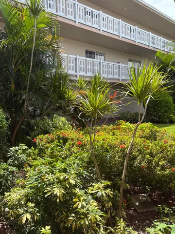 a view of an empty room and a window