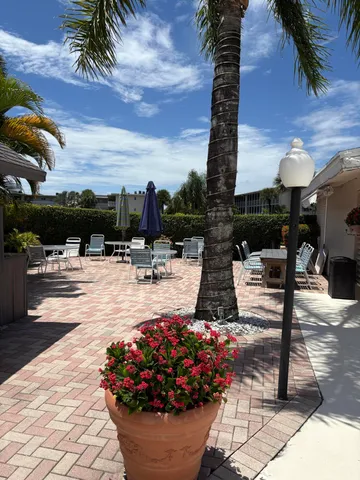 a view of a swimming pool with a patio