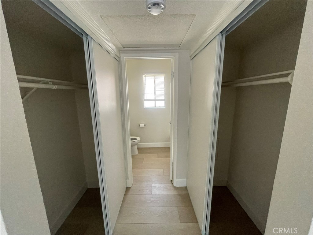 3703 Country Oaks Loop, Unit B Ontario, CA 91761 - Photo 20 of 30 a view of a hallway