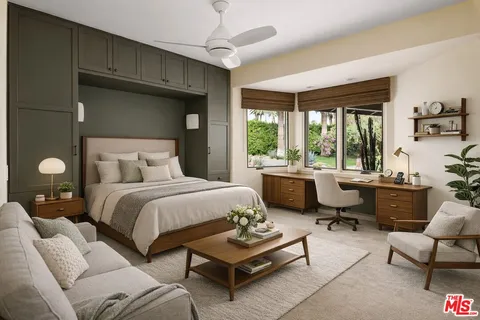 a bedroom with a bed gym equipment and a large window