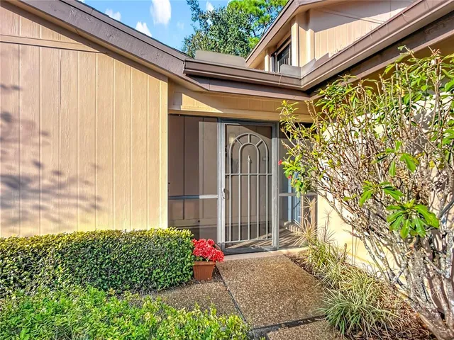 a front view of a house with a garage