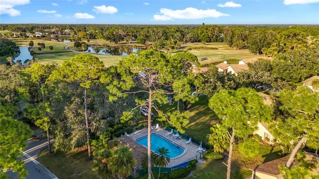 a view of a playground with basketball court