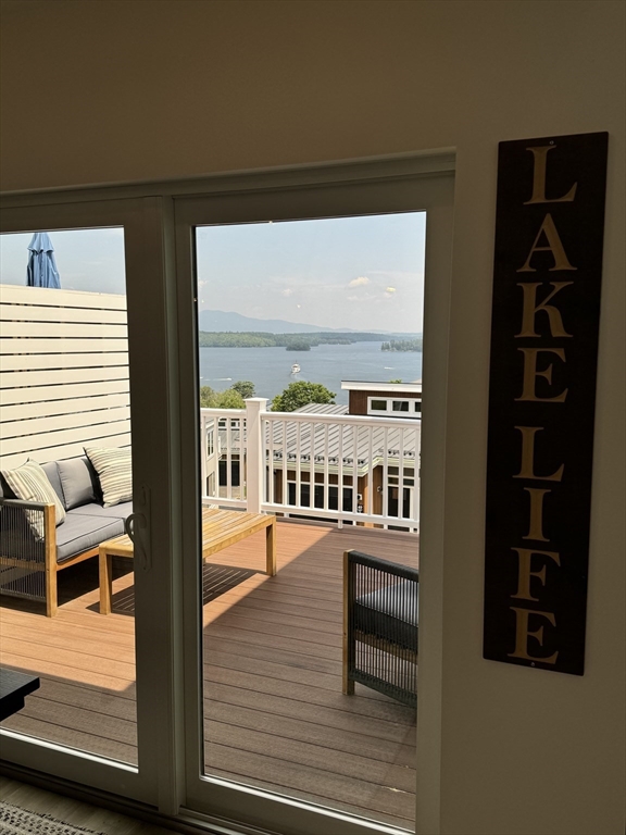 36 Vantage Point Drive, Unit 4 Laconia, NH 03246 - Photo 4 of 42 a view of a balcony having an outdoor space
