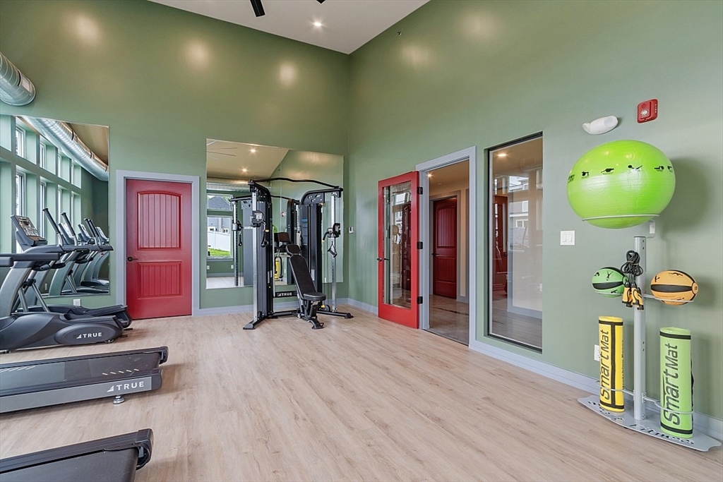 36 Vantage Point Drive, Unit 4 Laconia, NH 03246 - Photo 42 of 42 a view of a room with gym equipment